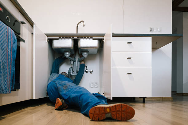 Professional Drain Cleaning technician working in Rex, GA